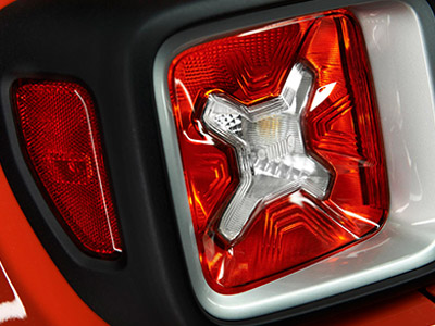 Rectangular tail lamps marked by vintage gas can design theme.